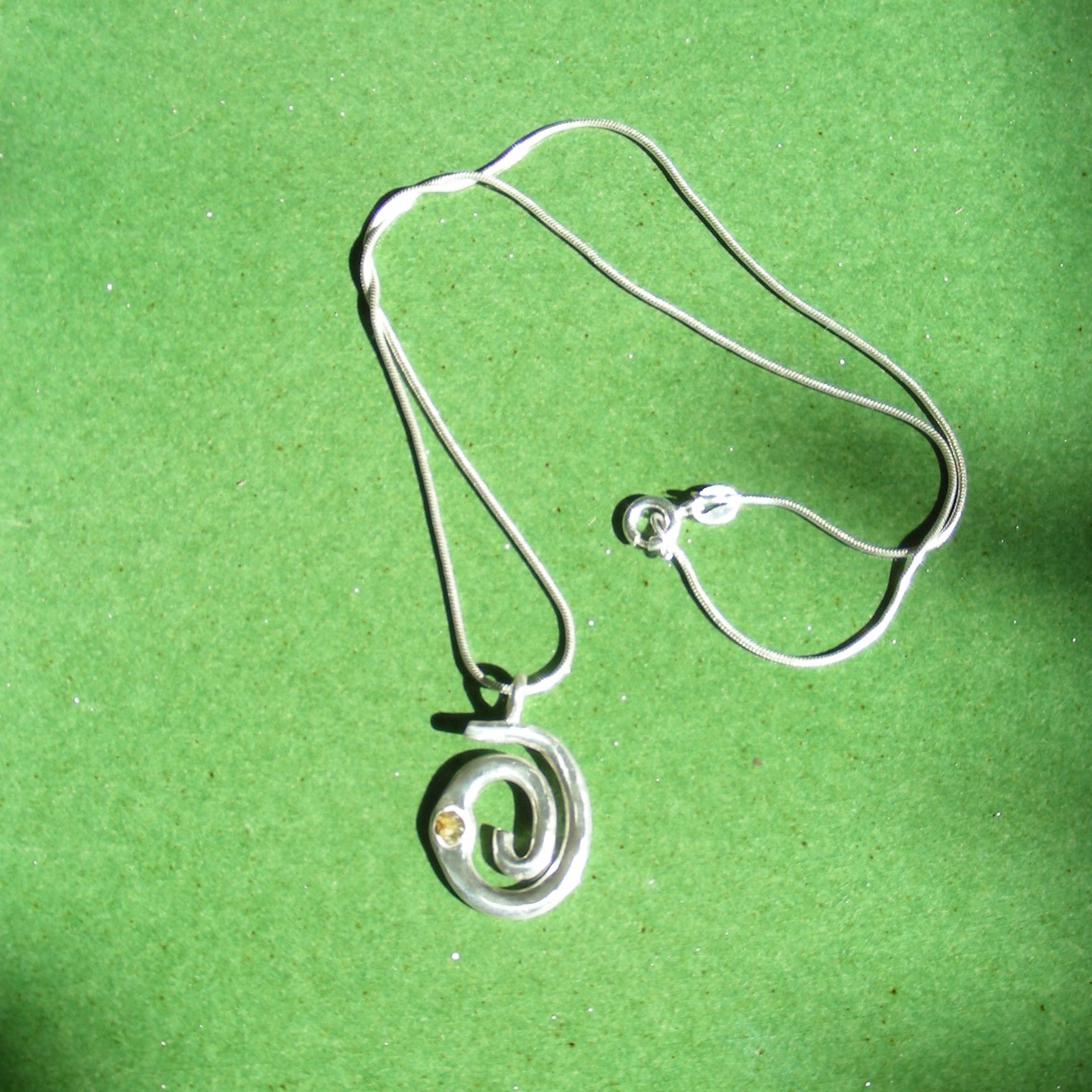 Nia - Olivine Spiral Necklace